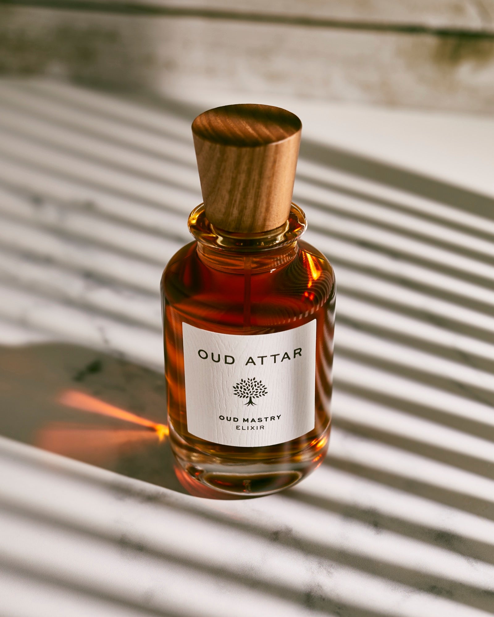 A 100ml Oud Attar elixir in amber glass