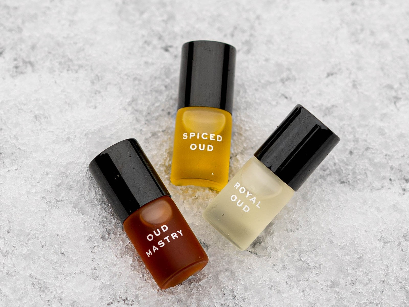 Three oud rollerballs resting in fresh snow